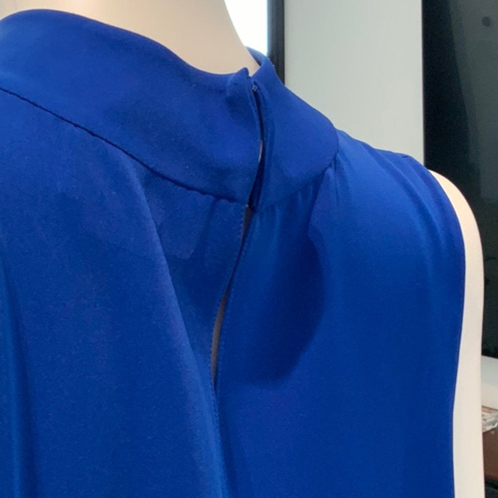 Elegant Blue top and pants set. Mock neck and flowing long back panels
